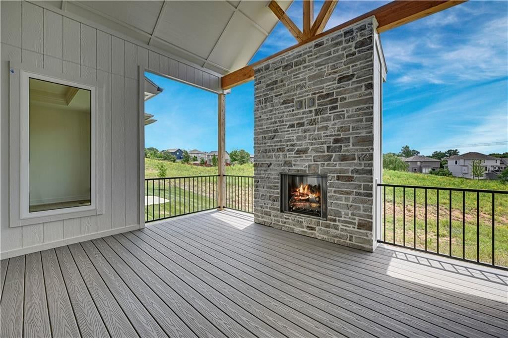 Deck, composite deck and outdoor fireplace at 15300 W 161st Court, Olathe, KS 66062