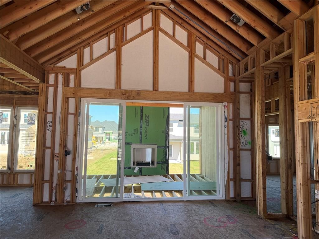 Fireplace and ceiling beams at 15300 W 161st Court, Olathe, KS 66062