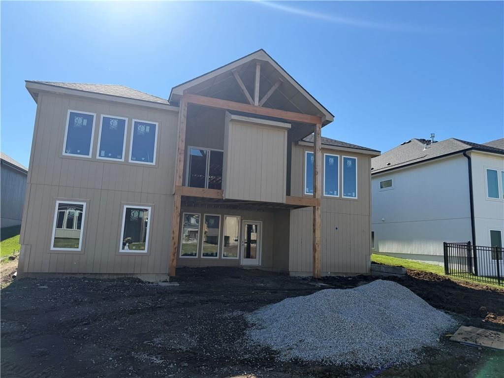 Mixed exterior materials and flat lot at 15300 W 161st Court, Olathe, KS 66062