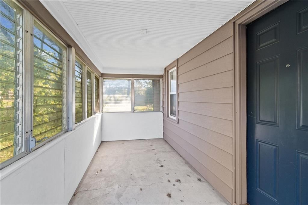 Covered front porch at 10213 E 71st Terrace, Raytown, MO 64133