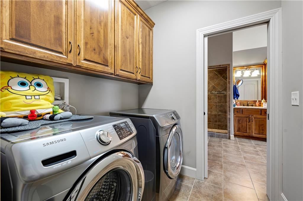 Laundry cabinets at 4323 NE Park Trails Court, Lee's Summit, MO 64064