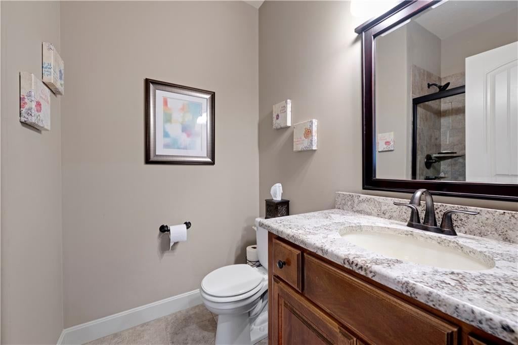 Double vanity and wood vanity at 4323 NE Park Trails Court, Lee's Summit, MO 64064