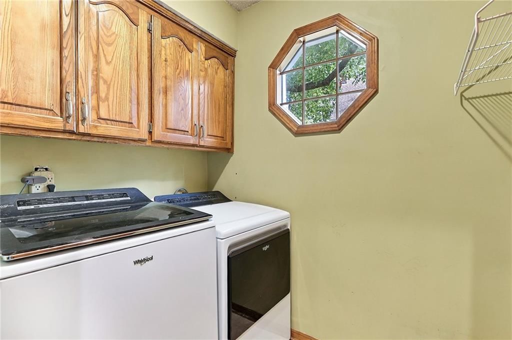 Laundry cabinets at 17612 E 48th Terrace Court S, Independence, MO 64055