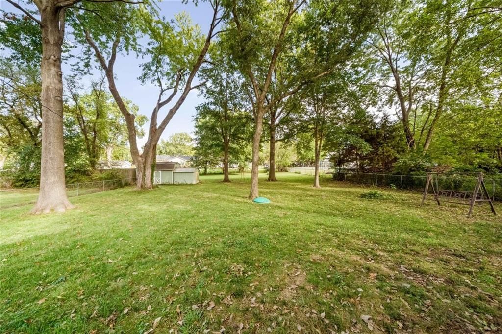 Big backyard at 705 SW Mitchell Street, Oak Grove, MO 64075