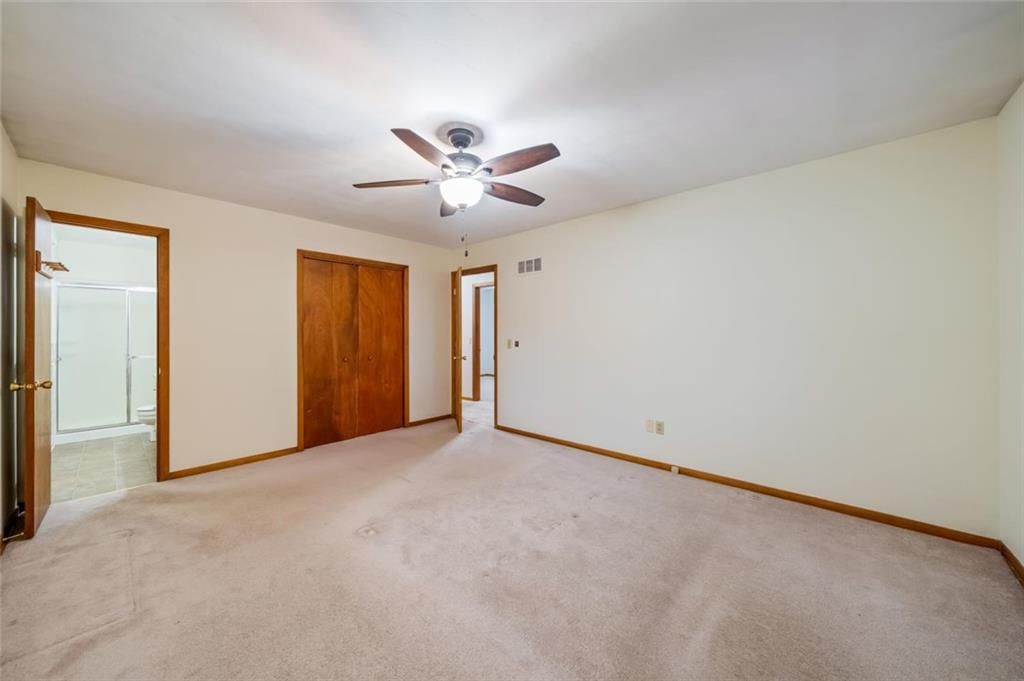 Walk-in closet at 705 SW Mitchell Street, Oak Grove, MO 64075