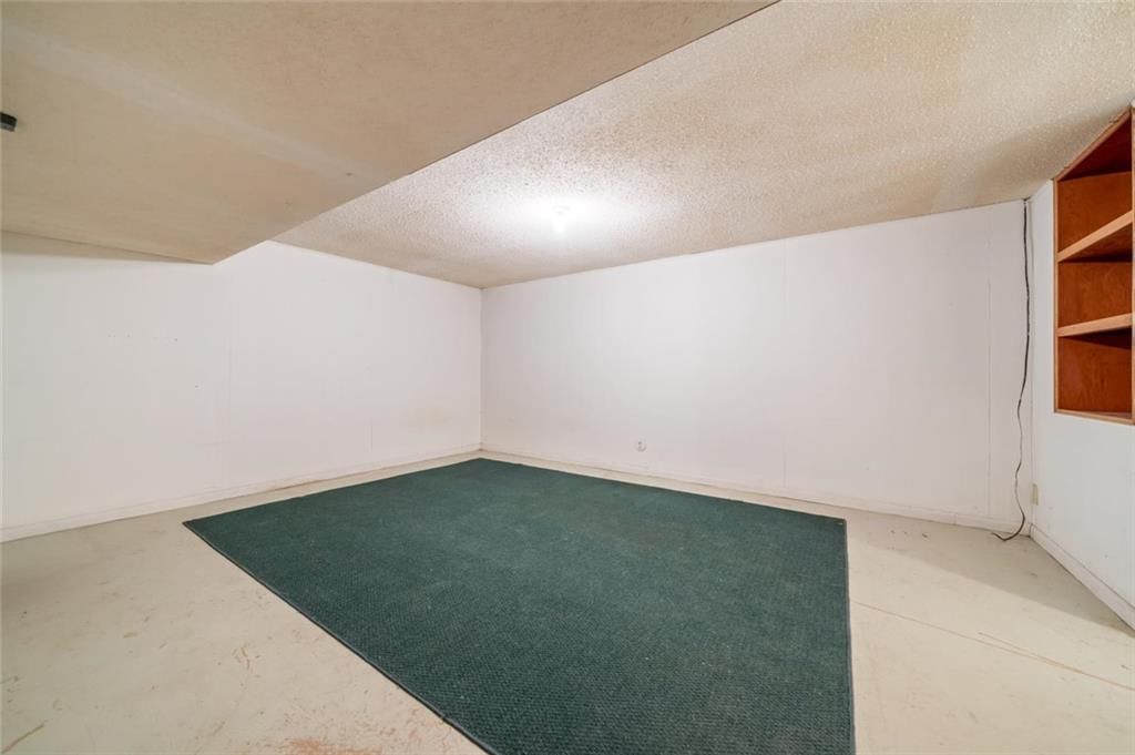 Finished basement at 705 SW Mitchell Street, Oak Grove, MO 64075