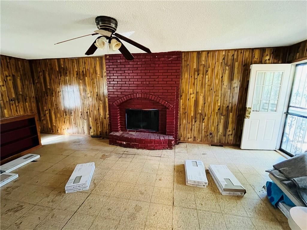 Fireplace and shiplap / paneling at 3829 Stonewall Court, Independence, MO 64055
