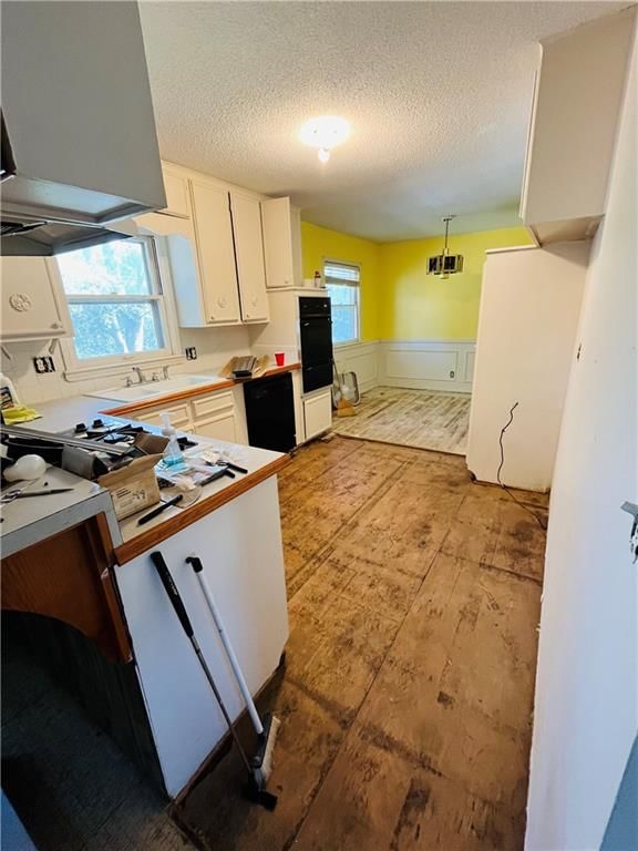 White kitchen and white trim at 3829 Stonewall Court, Independence, MO 64055
