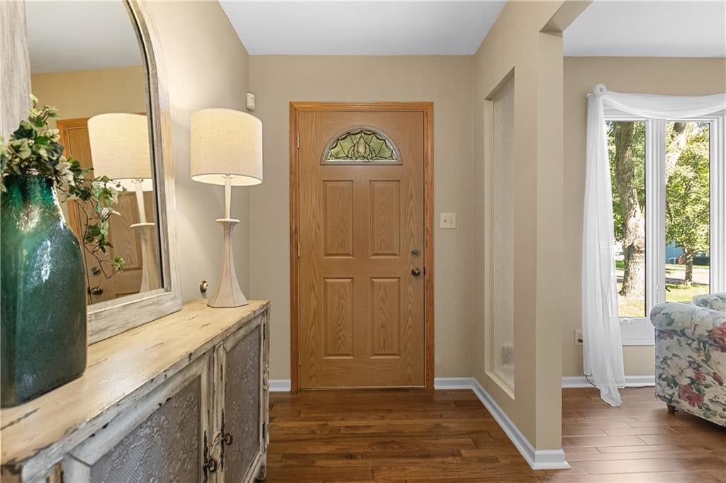 Hardwood floors, white trim and beige walls at 10909 W 102nd Street, Overland Park, KS 66214