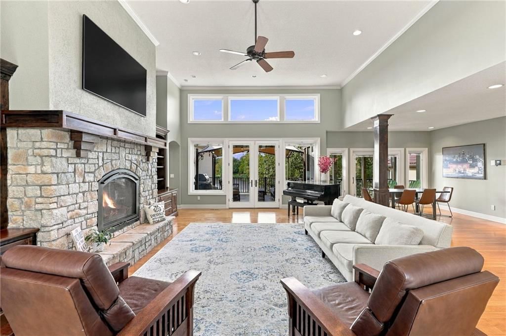 Tall ceilings, fireplace and open floor plan at 7810 NW Scenic Drive, Weatherby Lake, MO 64152