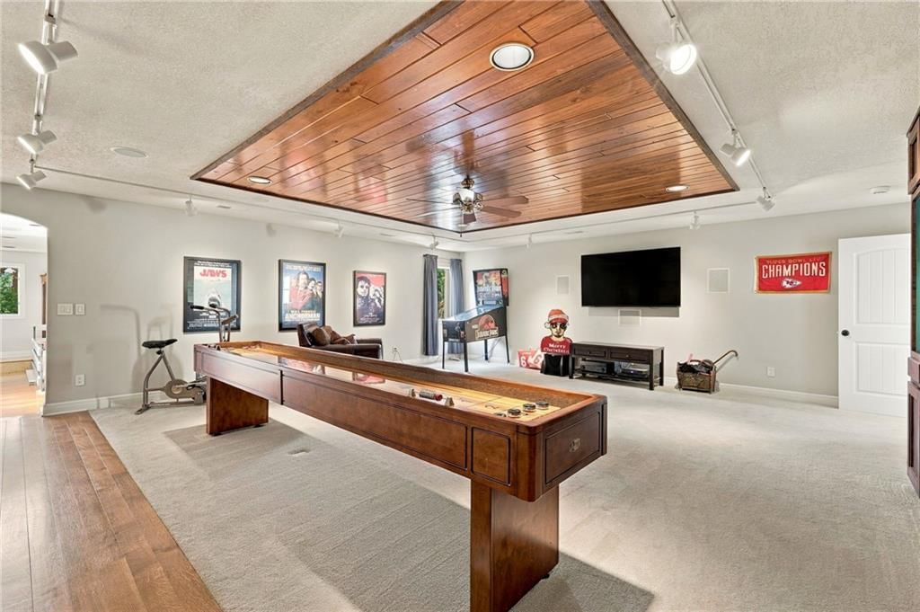 Finished basement and pool table at 7810 NW Scenic Drive, Weatherby Lake, MO 64152