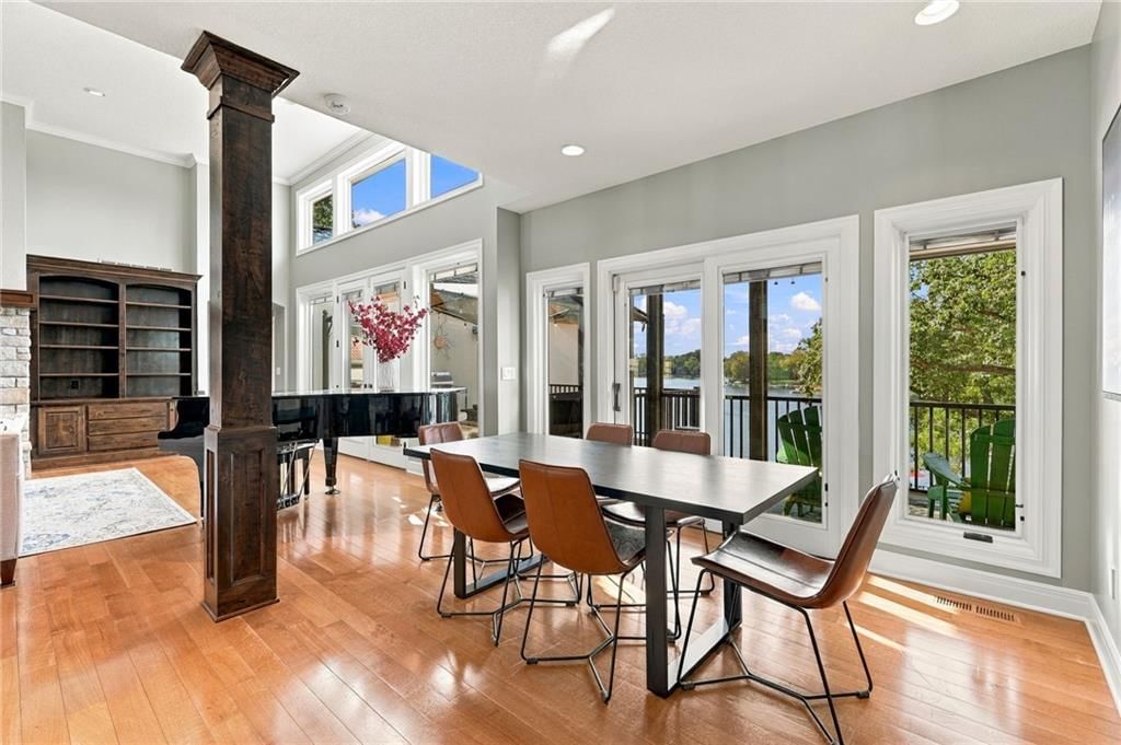 Hardwood floors, white trim and black hardware at 7810 NW Scenic Drive, Weatherby Lake, MO 64152