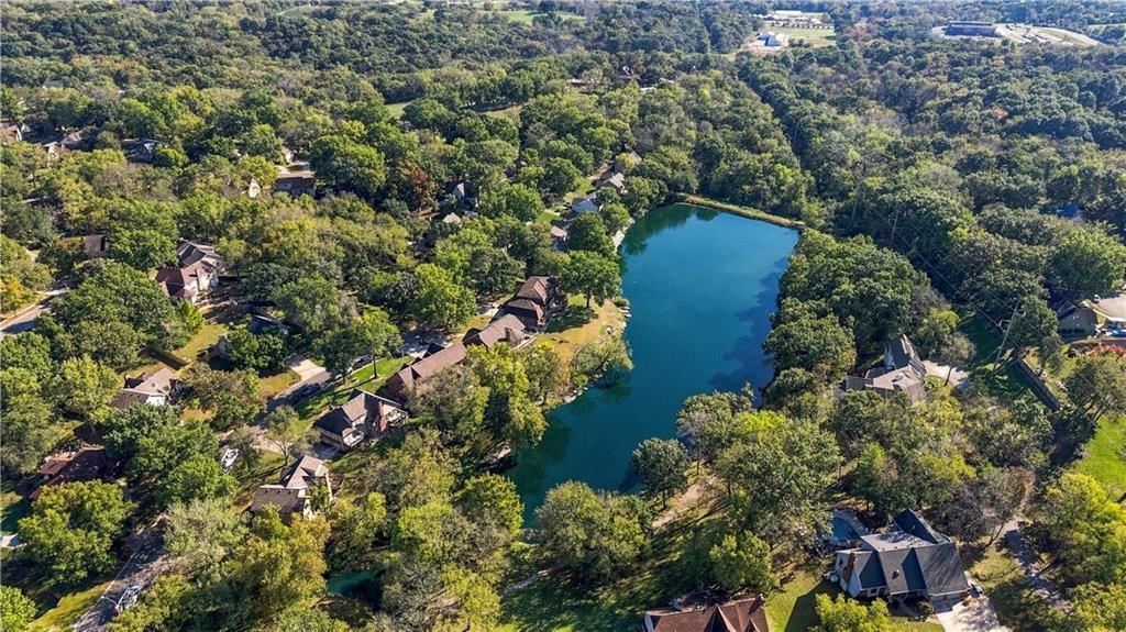 Pond or creek visible on the lot at 12908 E 58th Street, Kansas City, MO 64133