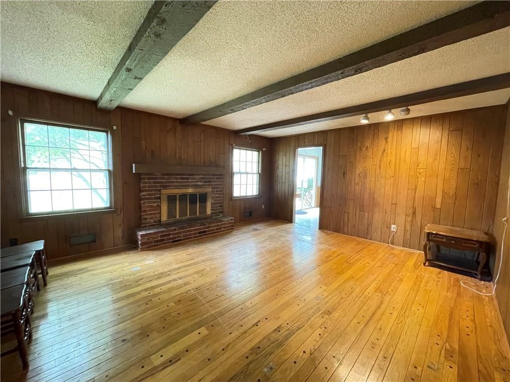 Fireplace and ceiling beams at 6926 W 101st Street, Overland Park, KS 66212