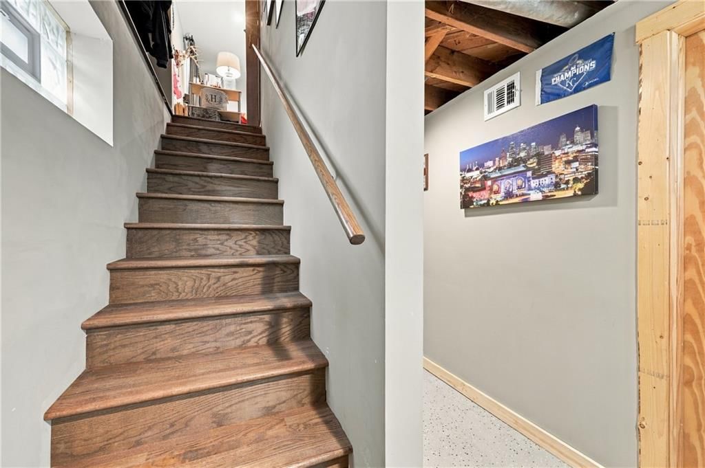 Epoxy garage floor and staircase at 8427 Jame A Reed Road, Raytown, MO 64138