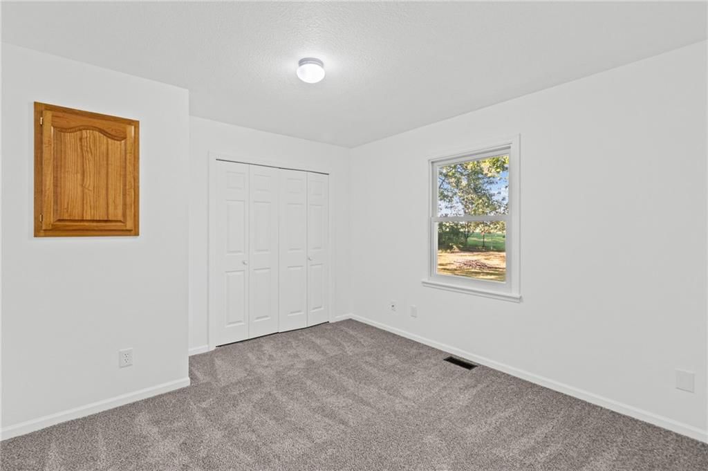 Walk-in closet at 29408 Vickie Drive, Excelsior Springs, MO 64024