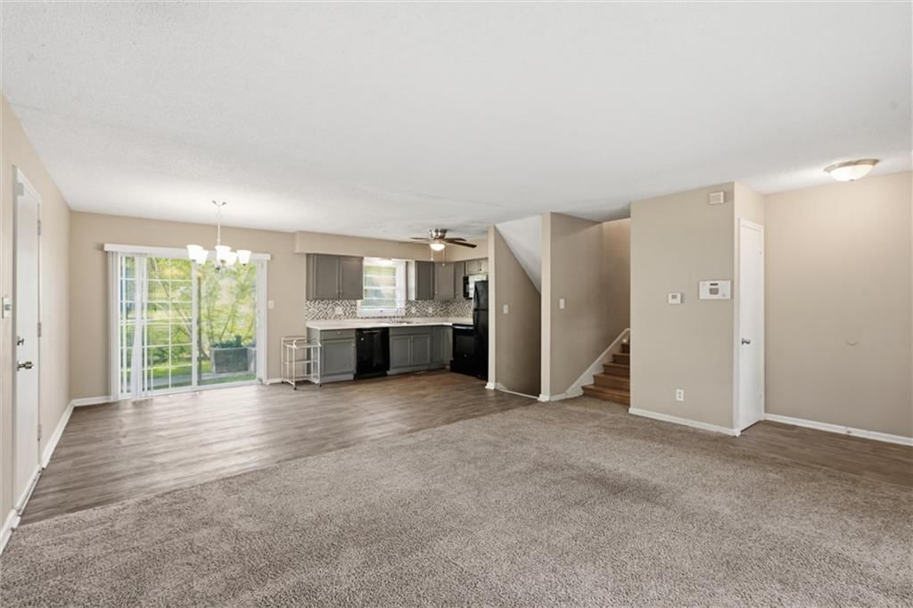Open floor plan and staircase at 8705 E 83rd Terrace, Raytown, MO 64138