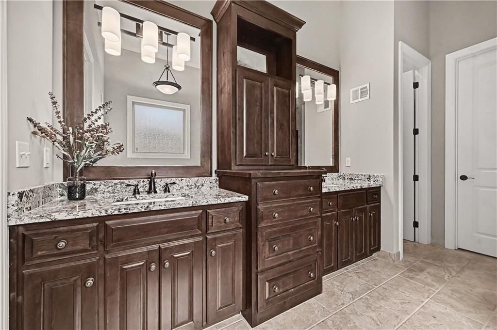 Tile floors and double vanity at 10812 W 153rd Street, Overland Park, KS 66221