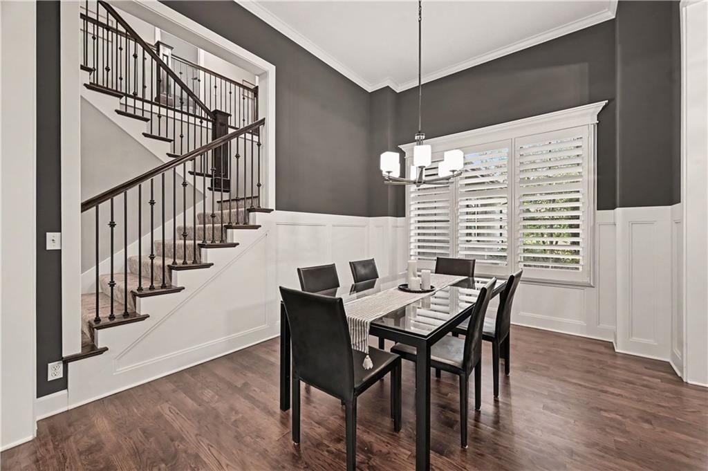 Wainscoting or board and batten and iron stair railing at 10812 W 153rd Street, Overland Park, KS 66221