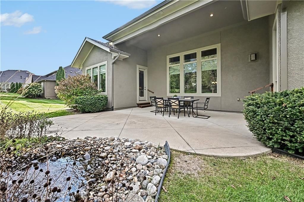 Covered patio and concrete patio at 10812 W 153rd Street, Overland Park, KS 66221
