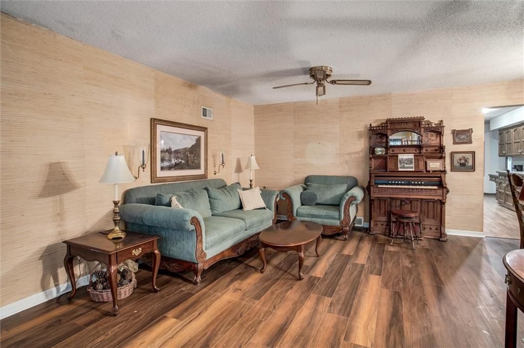 Hardwood floors and recessed lighting at 9007 E 68th Street, Raytown, MO 64133