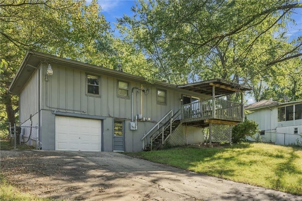 Attached garage and siding exterior at 2206 Wilson Avenue, Leavenworth, KS 66048