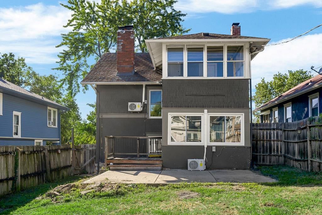 Wood fence and flat lot at 4217 Holmes Street, Kansas City, MO 64110