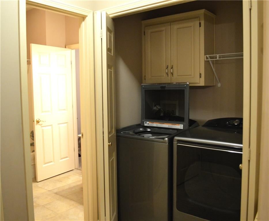 Laundry cabinets at 3101 NE 63 Terrace, Gladstone, MO 64119