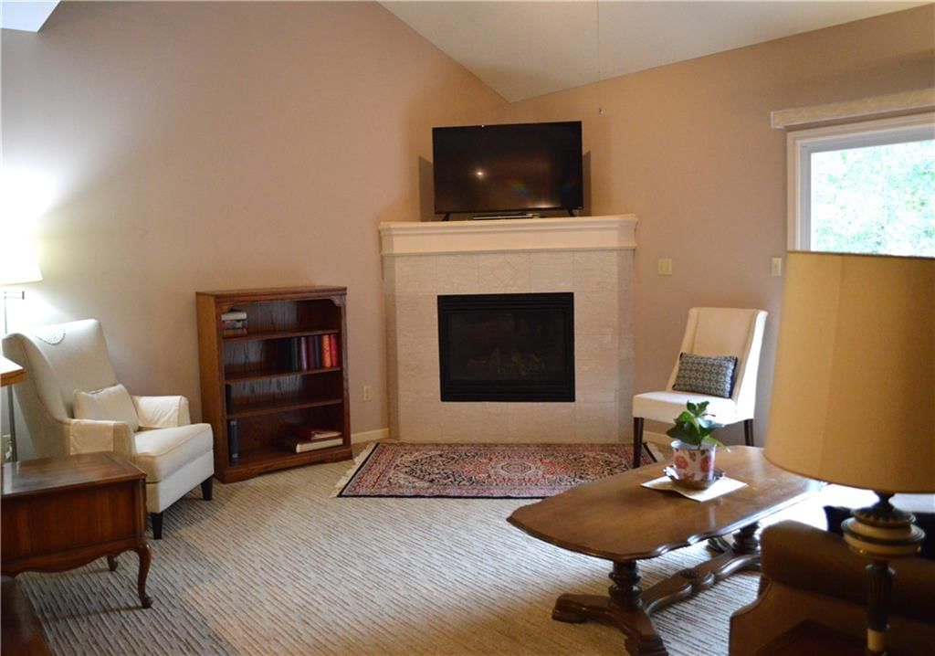 Tall ceilings, fireplace and recessed lighting at 3101 NE 63 Terrace, Gladstone, MO 64119