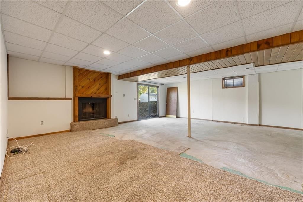 Finished basement and fireplace at 14705 W 91st Place, Lenexa, KS 66215