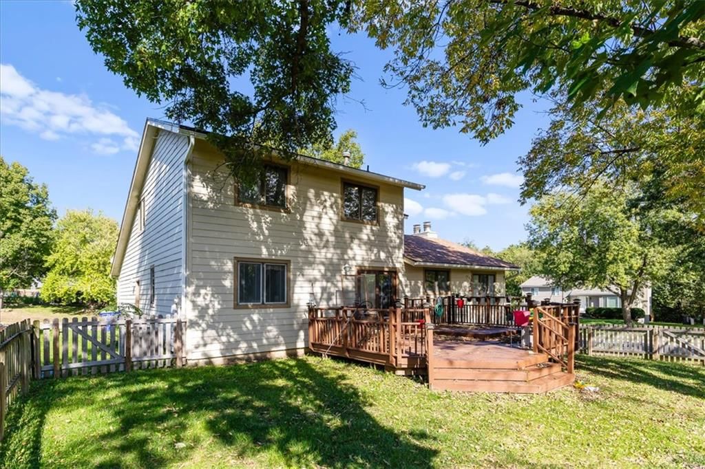 Deck and fenced yard at 14705 W 91st Place, Lenexa, KS 66215