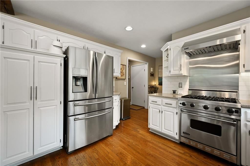 Photo 11: stainless steel appliances, 10830 S CEDAR NILES Boulevard, Olathe, KS 66061