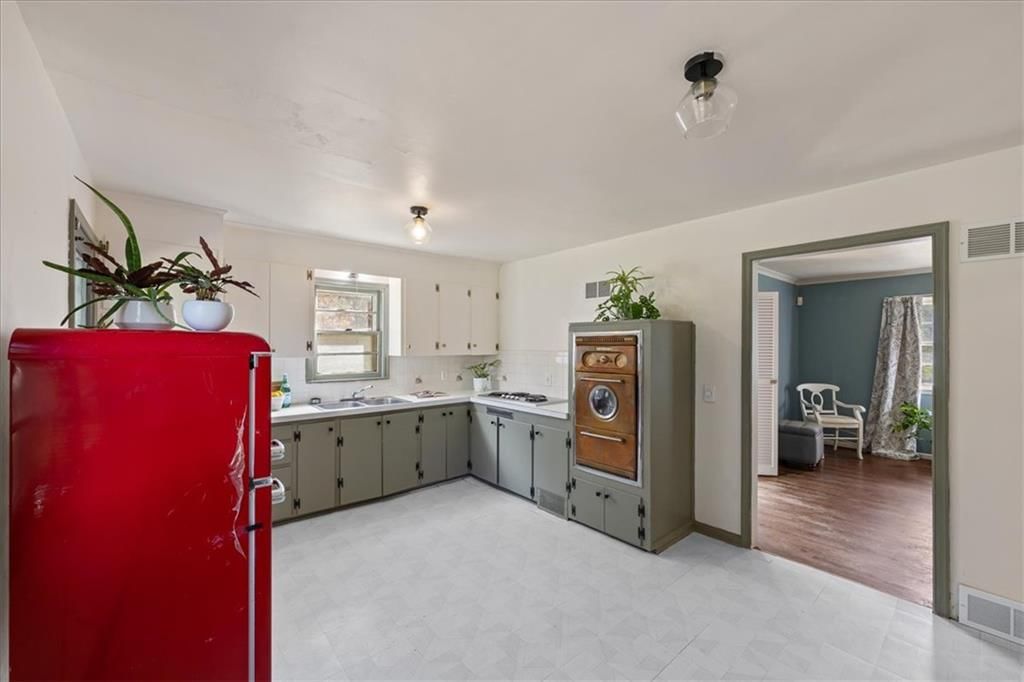 Photo 7: open floor plan, 6612 W 85th Street, Overland Park, KS 66212
