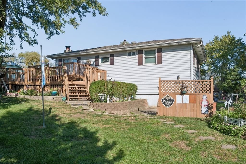 Fenced yard and wood fence at 7413 NW 84th Terrace, Kansas City, MO 64153