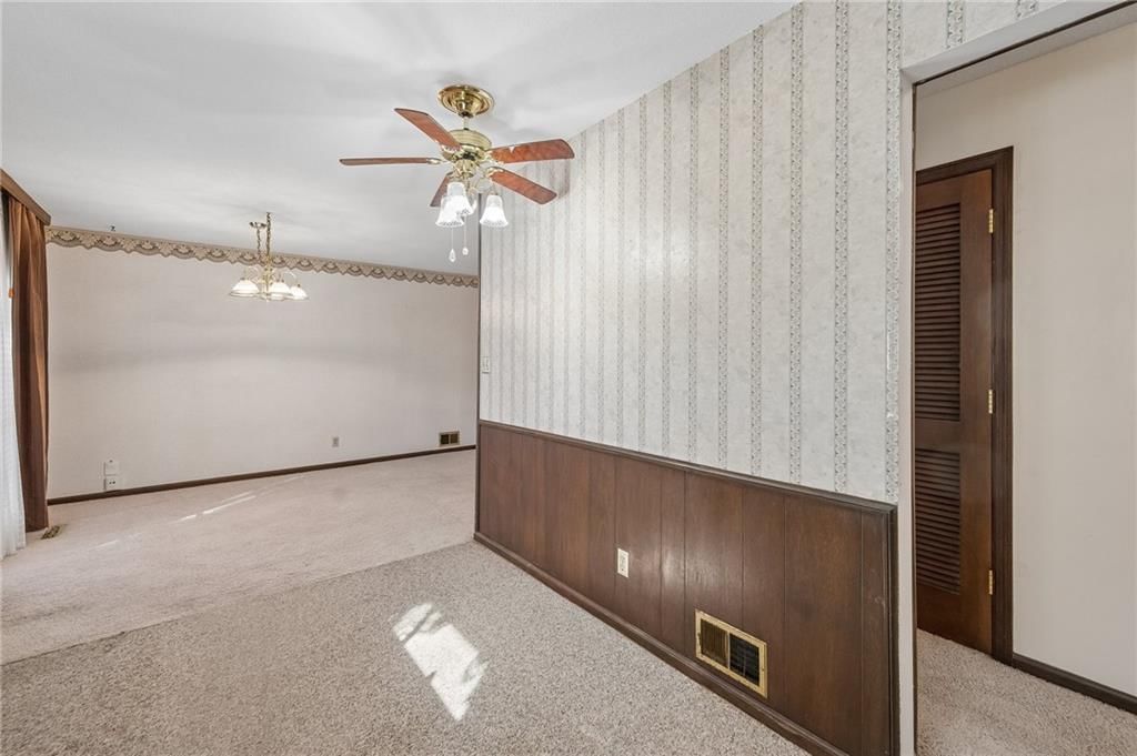 Wainscoting or board and batten at 7413 NW 84th Terrace, Kansas City, MO 64153