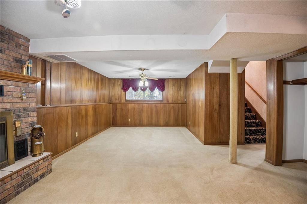 Fireplace and brick fireplace at 7413 NW 84th Terrace, Kansas City, MO 64153