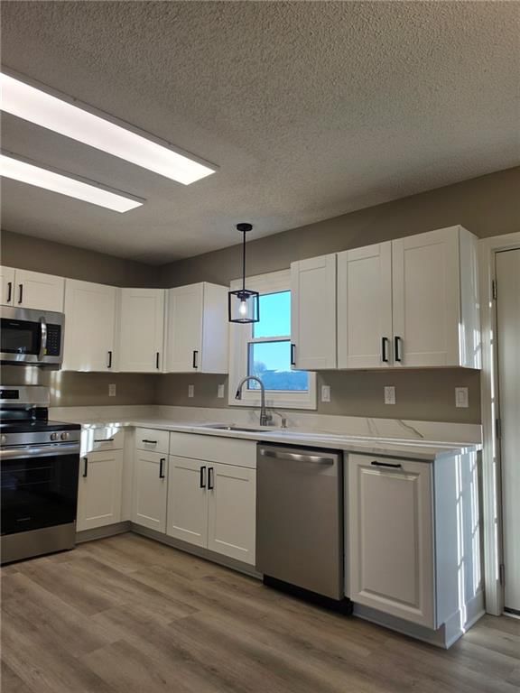Photo 8 of 22 - 603 SE 21st Street, Oak Grove, MO 64075