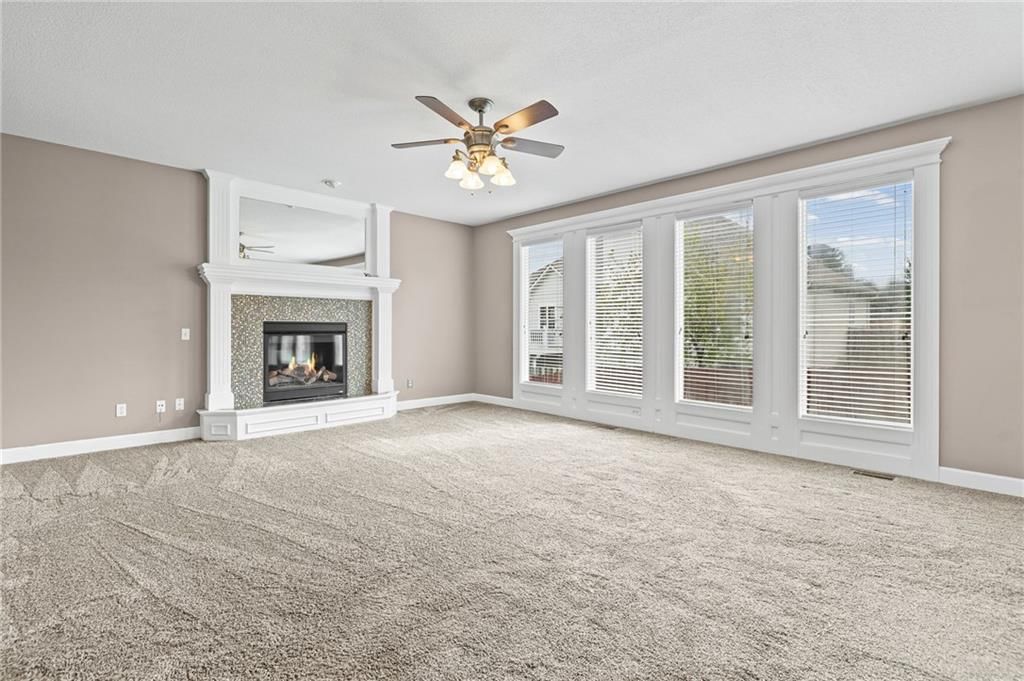 Fireplace and tile fireplace at 1703 NE 181st Terrace, Smithville, MO 64089