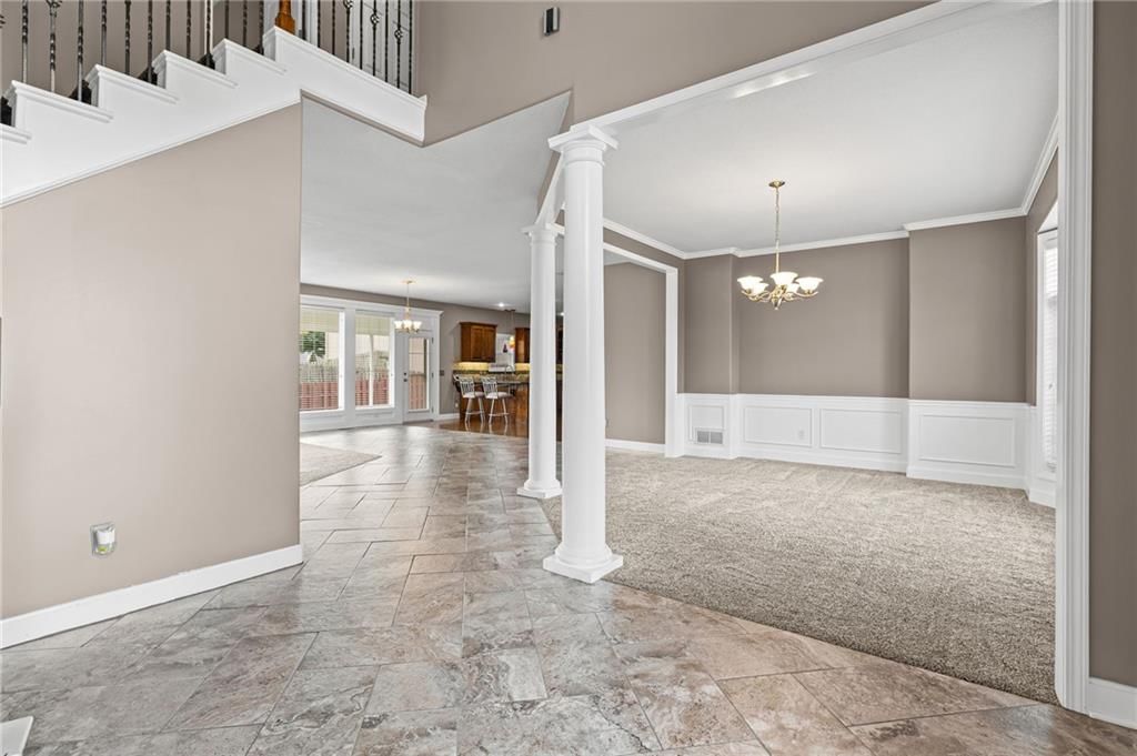 Open floor plan at 1703 NE 181st Terrace, Smithville, MO 64089