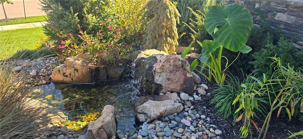 Pond or creek visible on the lot at 9401 W 169th Street, Overland Park, KS 66085