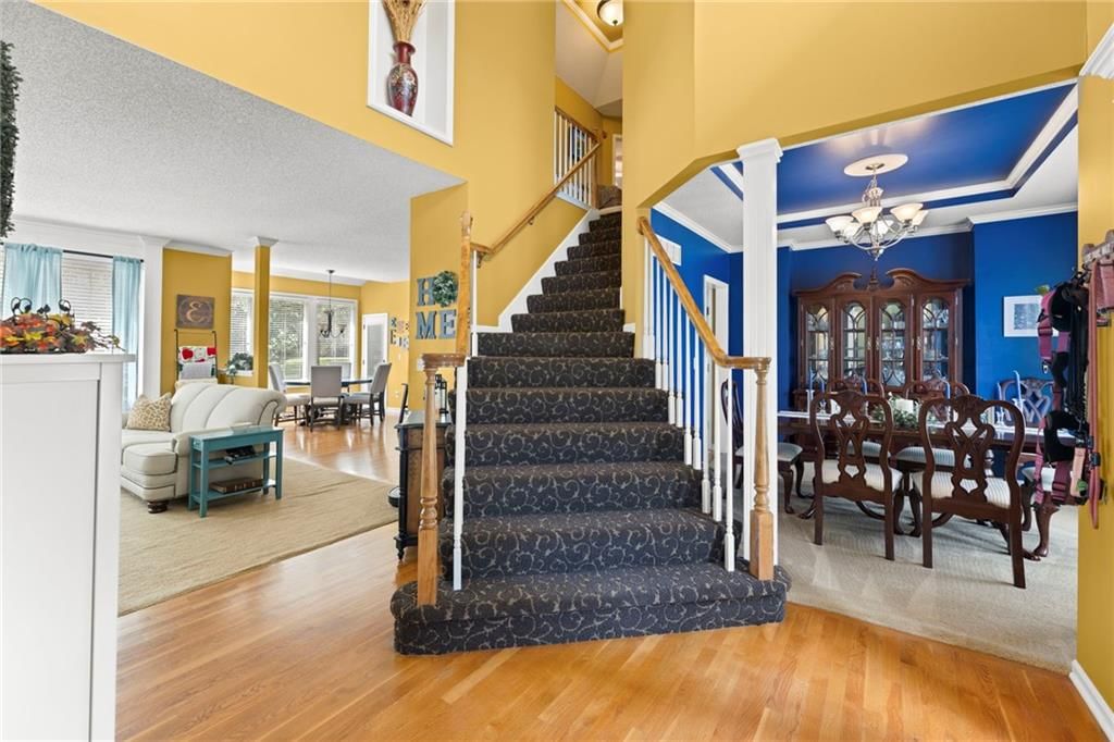 Open floor plan, hardwood floors and recessed lighting at 22007 52nd Street, Shawnee, KS 66226