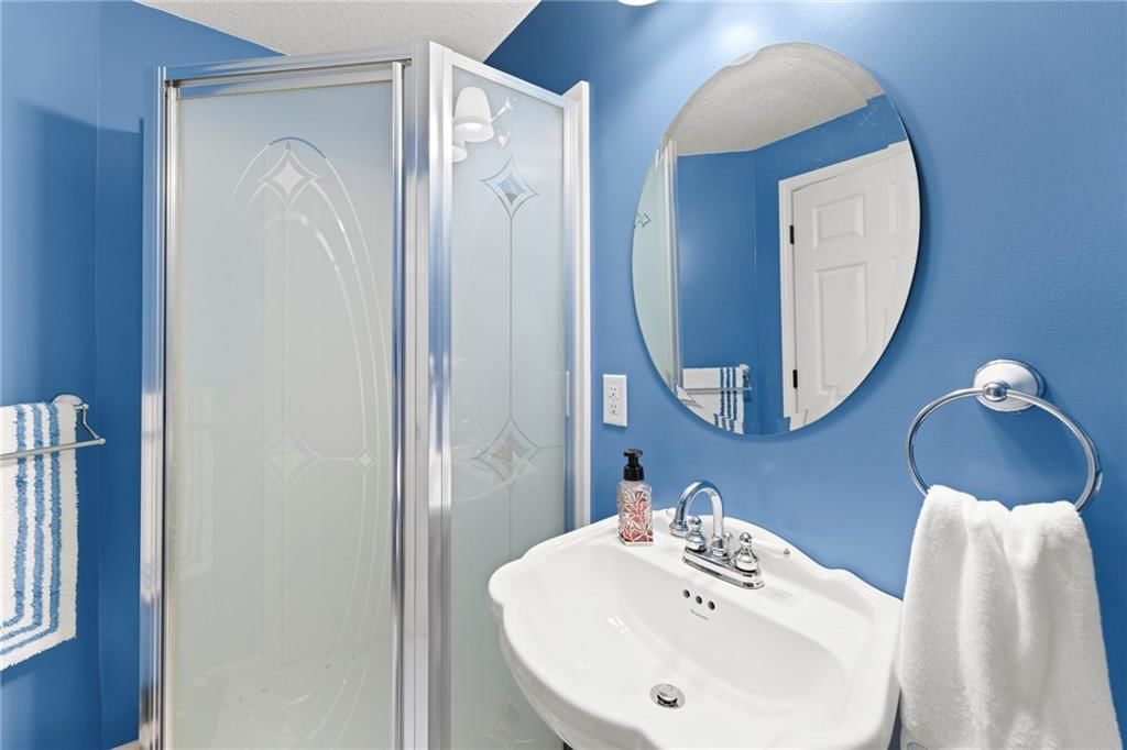 Tiled shower at 22007 52nd Street, Shawnee, KS 66226