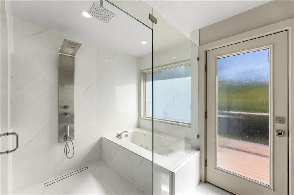 Walk-in shower at 4503 NE Waters Edge Street, Lee's Summit, MO 64064