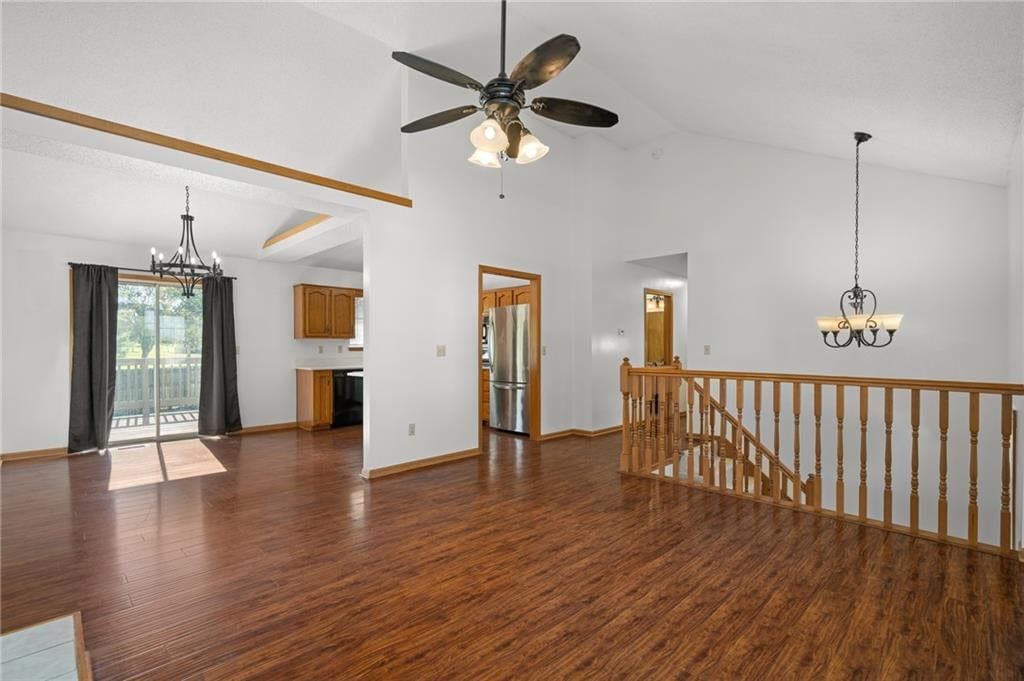 Open floor plan and statement lighting at 2513 SE WINCHESTER Drive, Lee's Summit, MO 64063