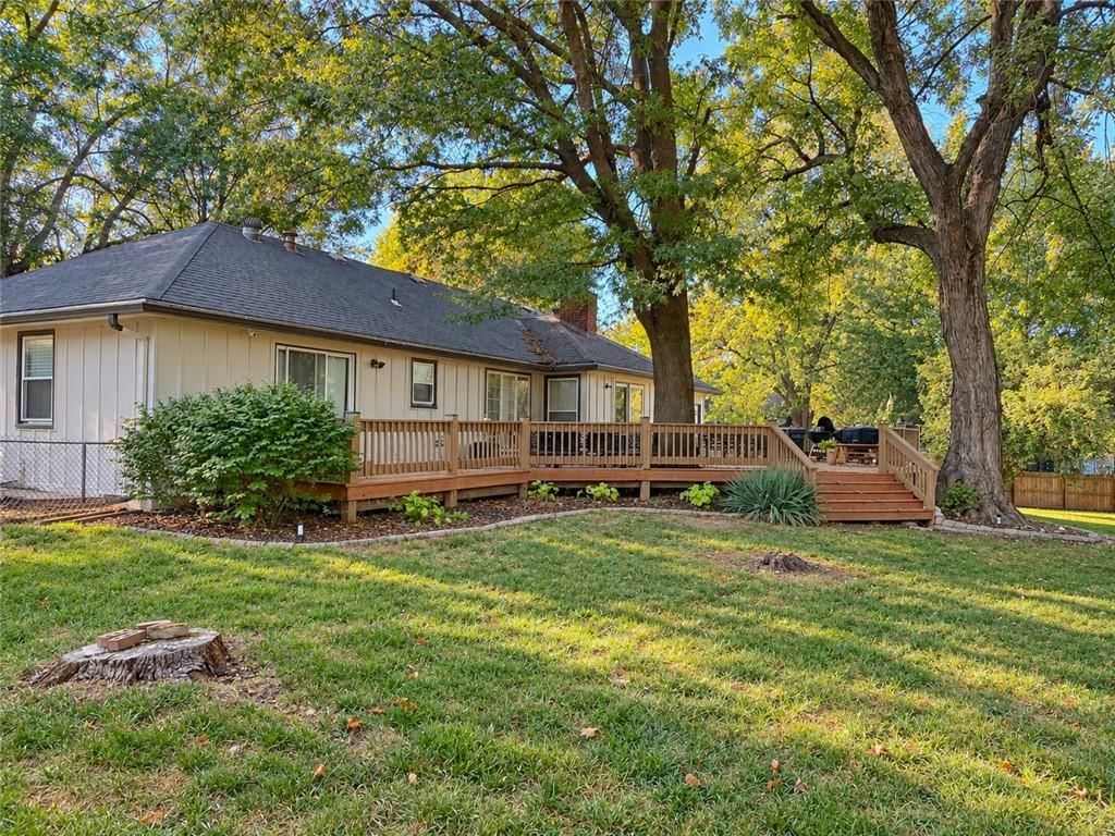 Deck, big backyard and fenced yard at 6523 GOODE Drive, Shawnee, KS 66216