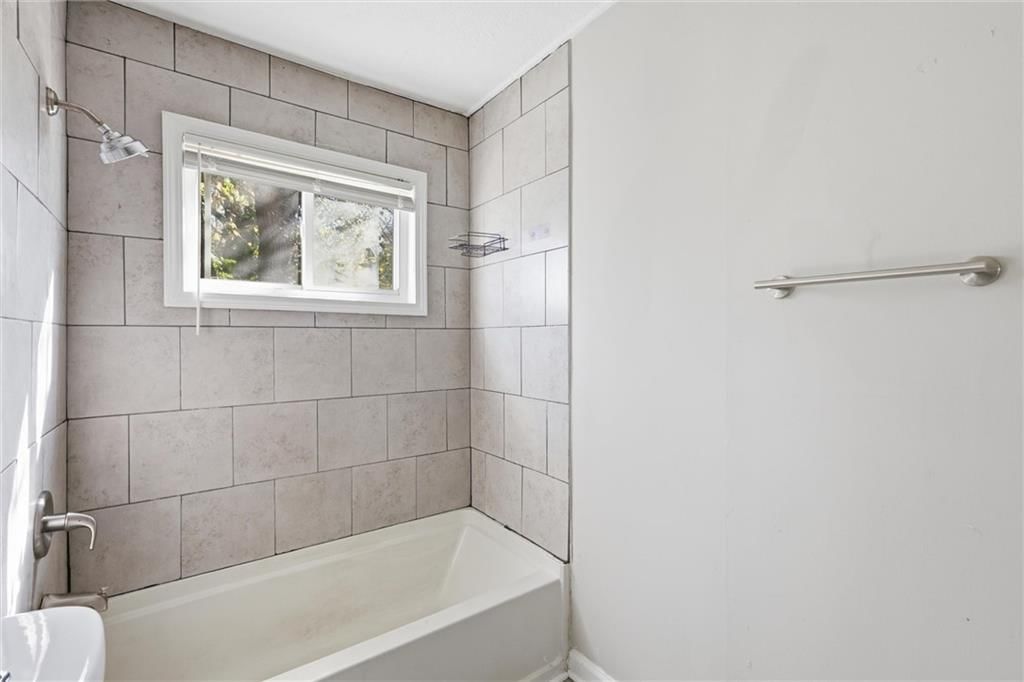 Tiled shower at 10030 E 22ND Street, Independence, MO 64052