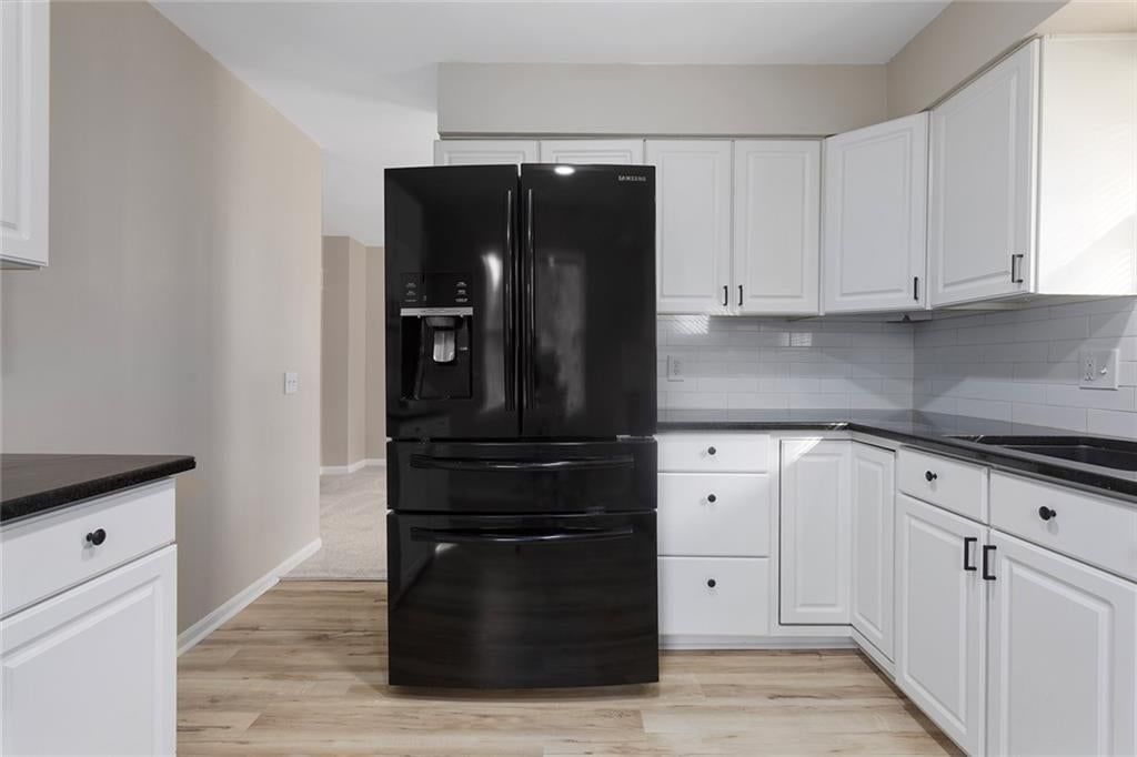 High end appliances and black countertops at 5708 NE 50th Street, Kansas City, MO 64119