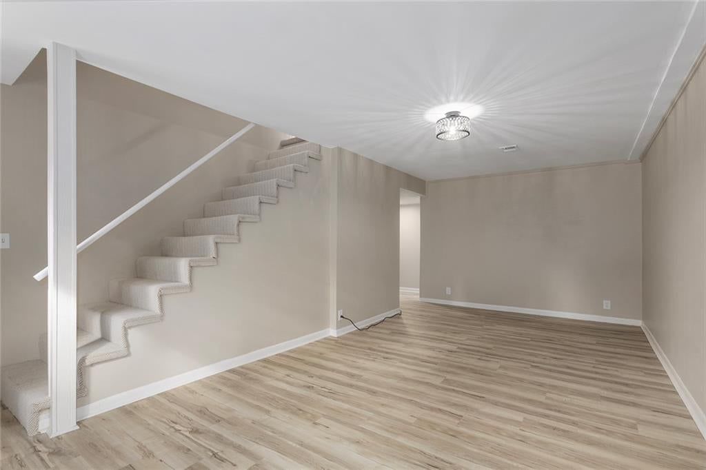 Open-riser staircase at 5708 NE 50th Street, Kansas City, MO 64119