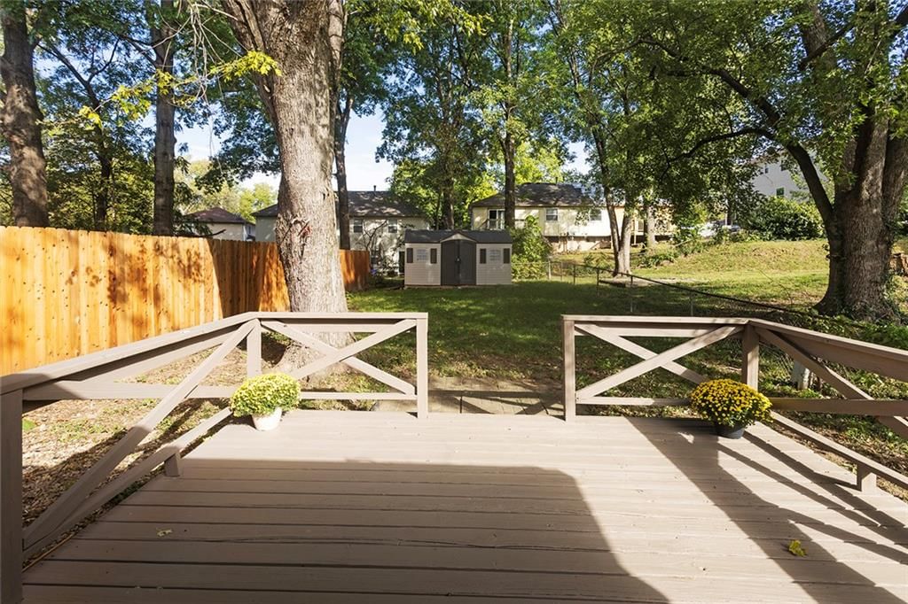 Deck, mature trees and composite deck at 5708 NE 50th Street, Kansas City, MO 64119