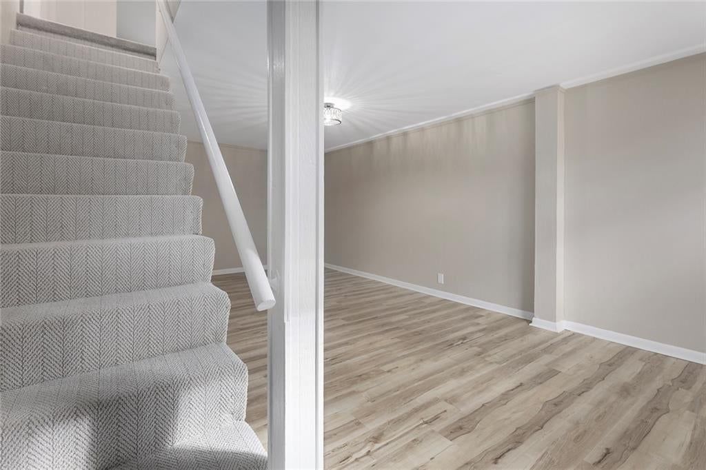 Staircase and wood stair railing at 5708 NE 50th Street, Kansas City, MO 64119